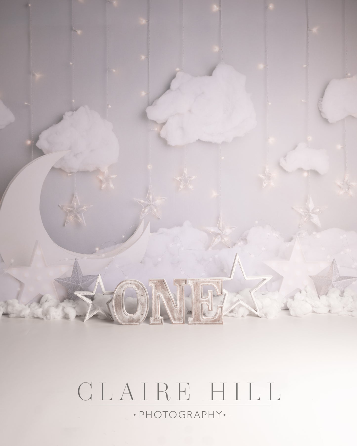 Babies first year photographer bundle in Wolverhampton West Midlands near Birmingham and Shropshire three photo shoots including newborn photography Sitter session and cake smash photo shoot by Claire Hill Photography.