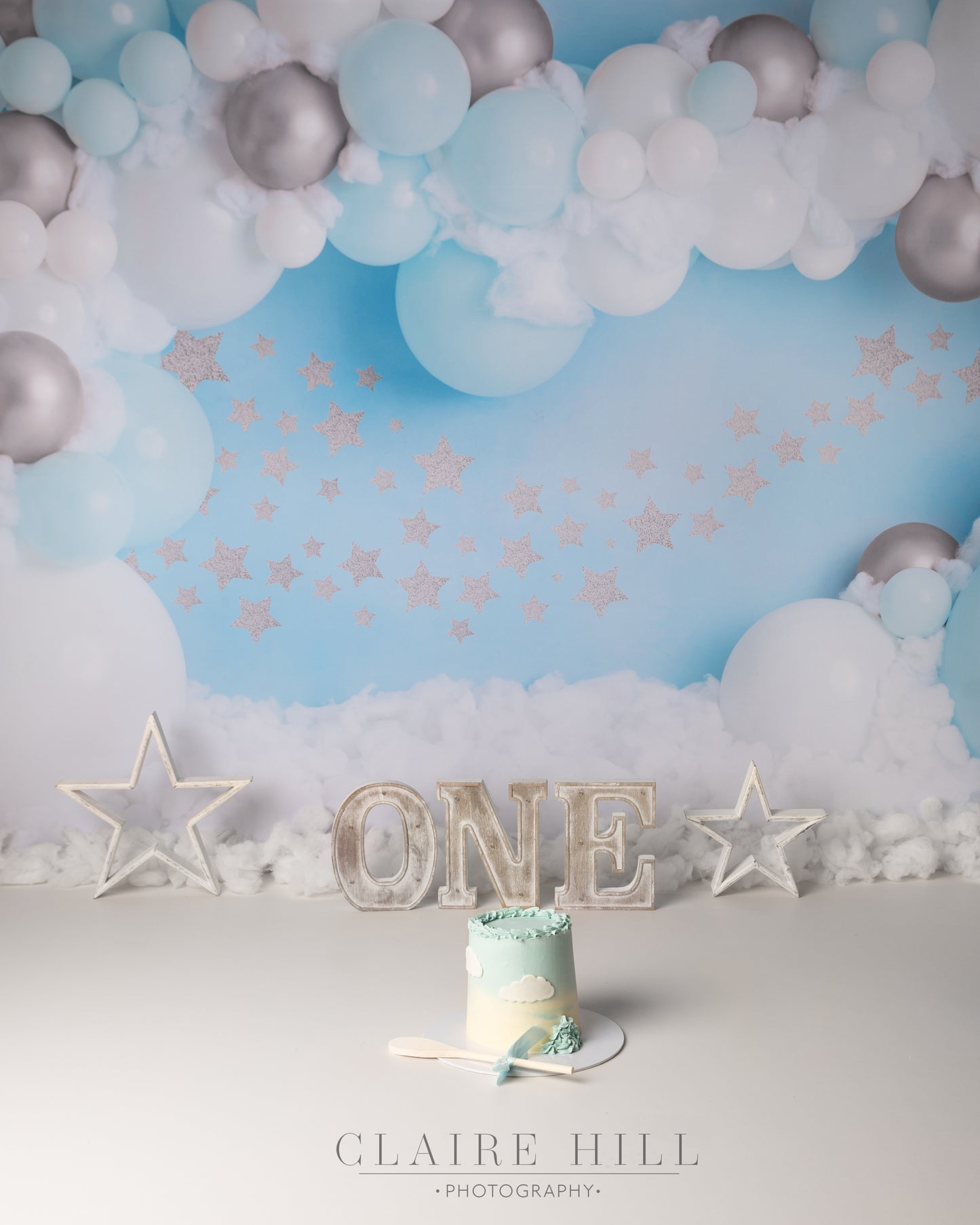 Babies first year photography bundle in Wolverhampton West Midlands near Birmingham and Shropshire three photo shoots including newborn photography Sitter session and cake smash photo shoot by Claire Hill Photography.