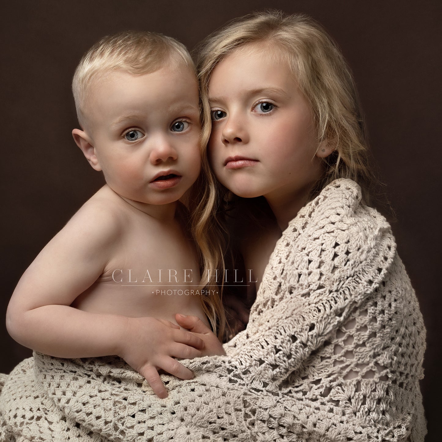 Professional brother and sister sibling photography photos by Claire Hill Photography. Studio based in Perton Wolverhampton West Midlands and Shropshire book today