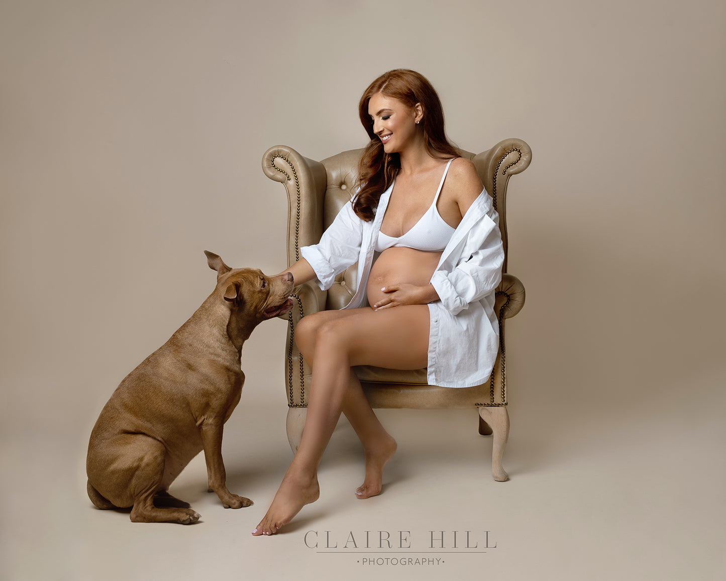 Heartwarming maternity photoshoot featuring an expectant mother and her pet by Claire Hill Photography in the West Midlands
