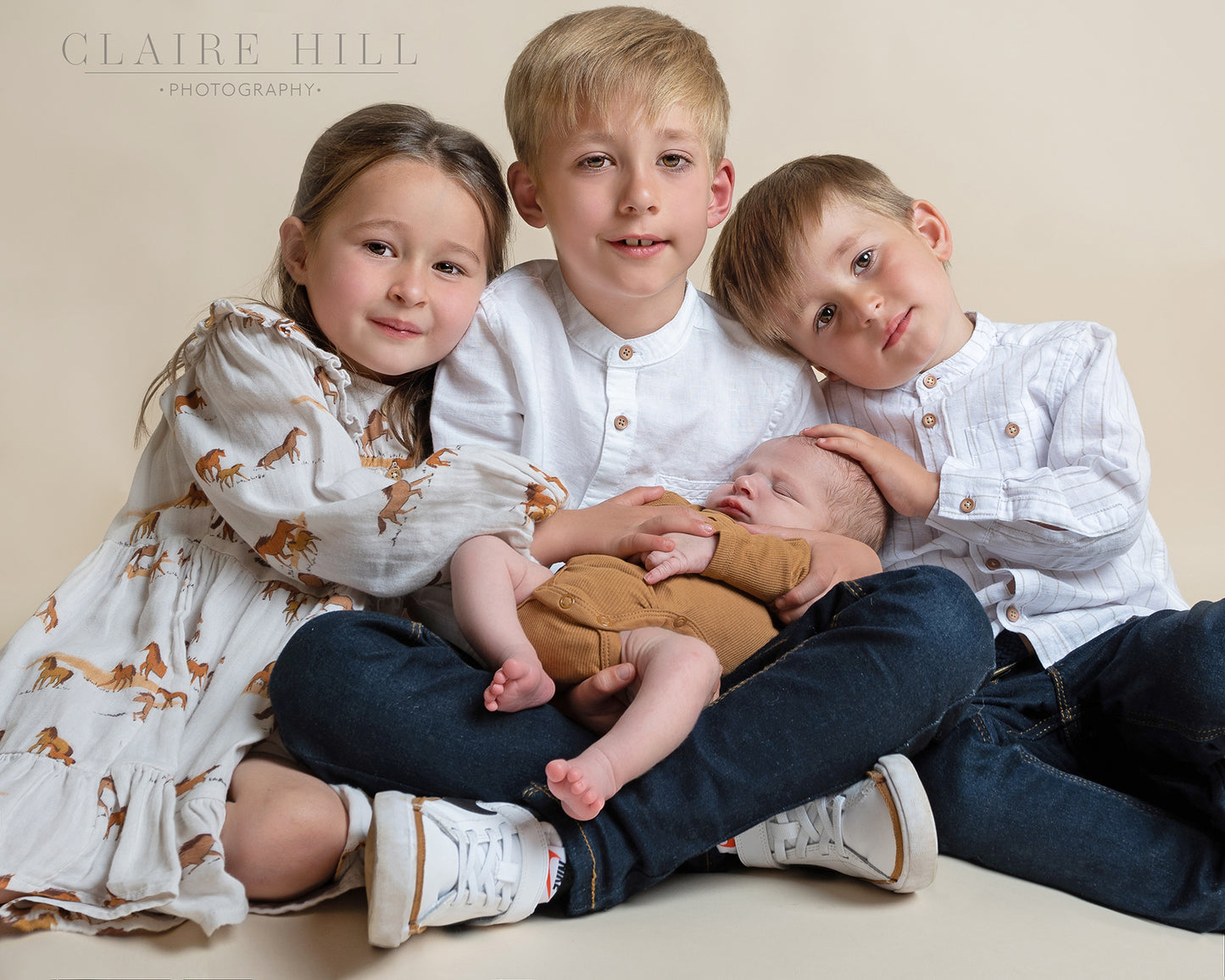 Professional family sibling photography photos by Claire Hill Photography. Studio based in Perton Wolverhampton West Midlands and Shropshire book today