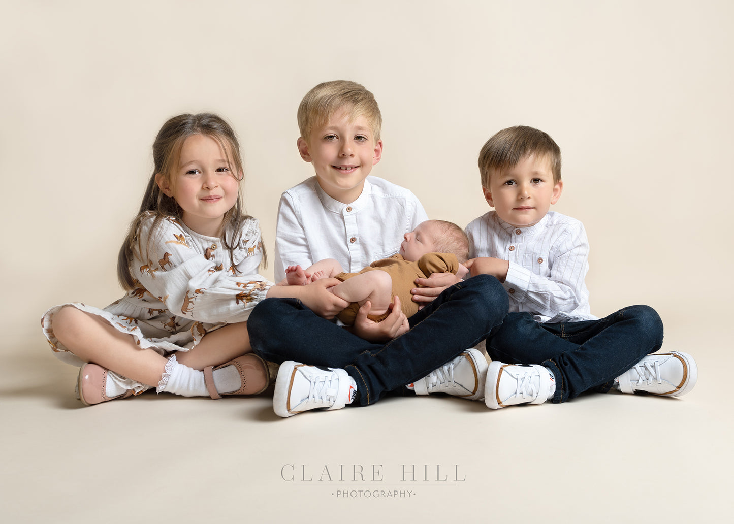 Professional family sibling photography photos by Claire Hill Photography. Studio based in Perton Wolverhampton West Midlands and Shropshire book today
