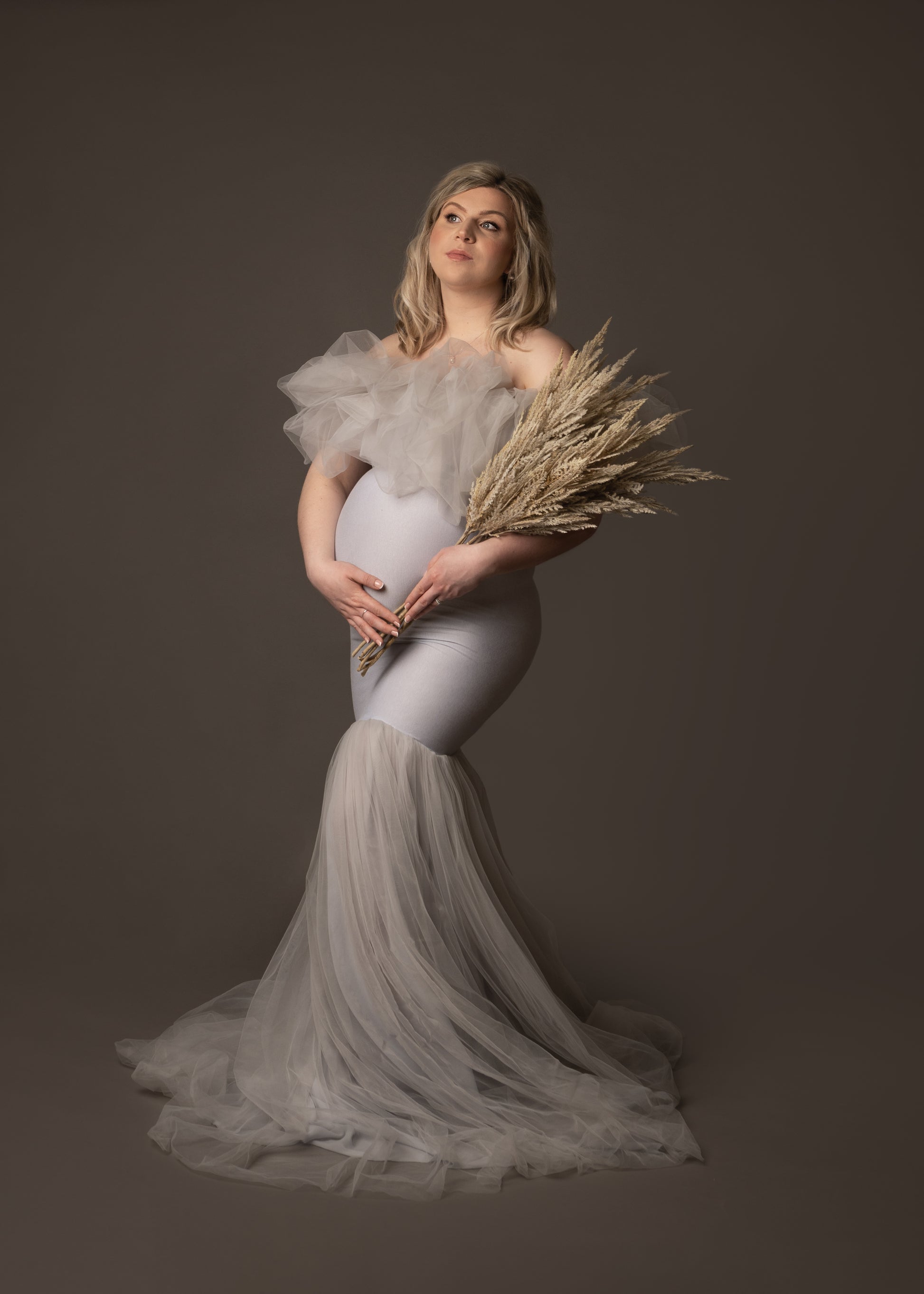 Professional maternity photoshoot capturing the beauty of pregnancy in Wolverhampton, by Claire Hill Photography.