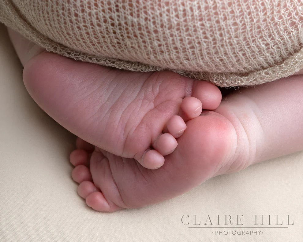 Adorable newborn baby photos captured in the West Midlands, Staffordshire, & Shropshire, highlighting a baby's first moments by Claire Hill Photography.