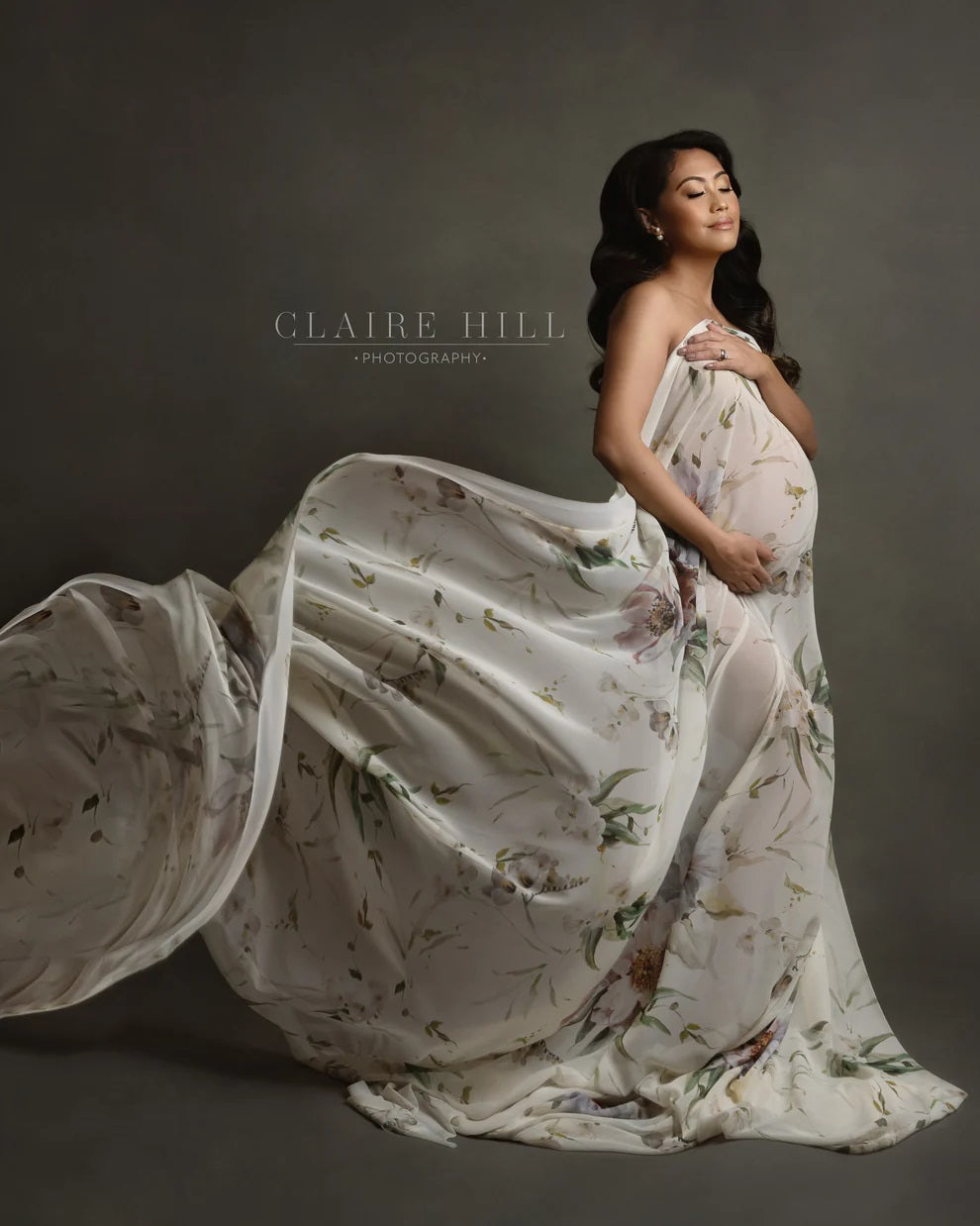 Creative pregnancy photo shoot in Birmingham, capturing a radiant expectant mother in an artistic portrait by Claire Hill Photography.