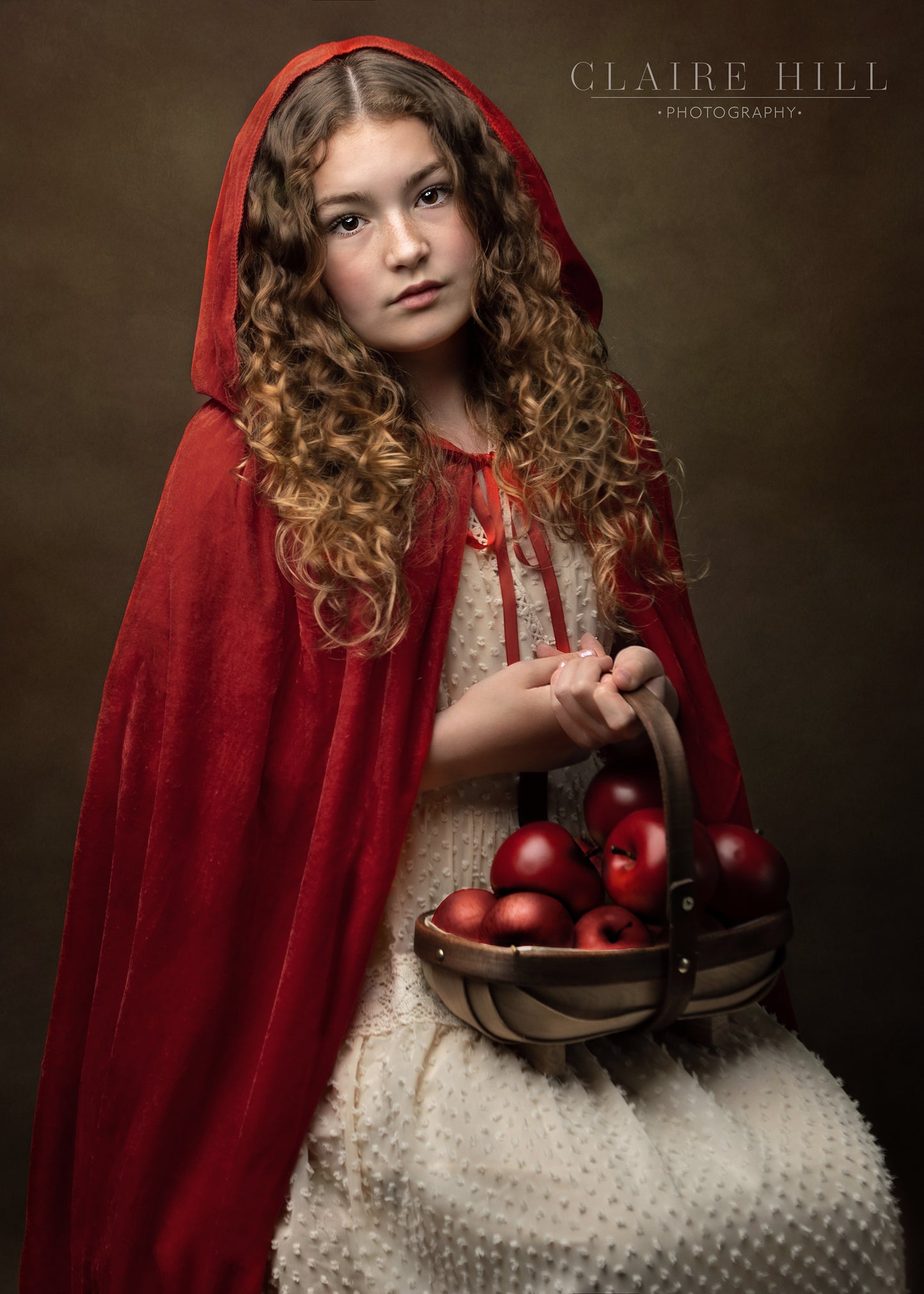 Magical fairytale photo shoot little red riding hood themed photos by Claire Hill Photography. Studio based in  Perton Wolverhampton West Midlands and Shropshire book today